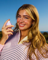 Model with face mist