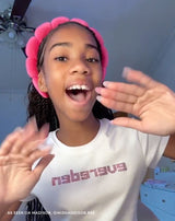 Bedazzled Baby Tee spread to highlight its texture