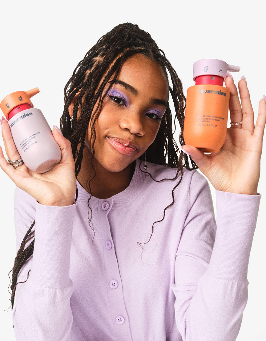 Model with shampoo and conditioner. 