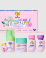 Polly Pocket™ × Evereden Pocket-Sized Kids Self-Care Set box with the five travel-size products: Kids Multi-Vitamin Face Wash and Face Cream in Cool Peach, Kids Detangling Shampoo and Conditioner, and heart-shaped Kids Lip Balm keychain
