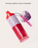 Exclusive glitter charm included!