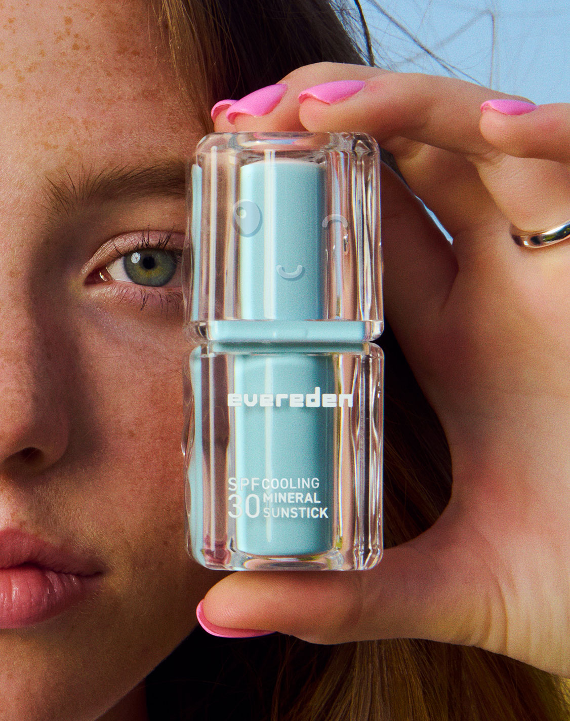 Model holding SPF30 Sunstick