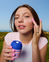 Model Applying Kids Multi-Vitamin Face Cream